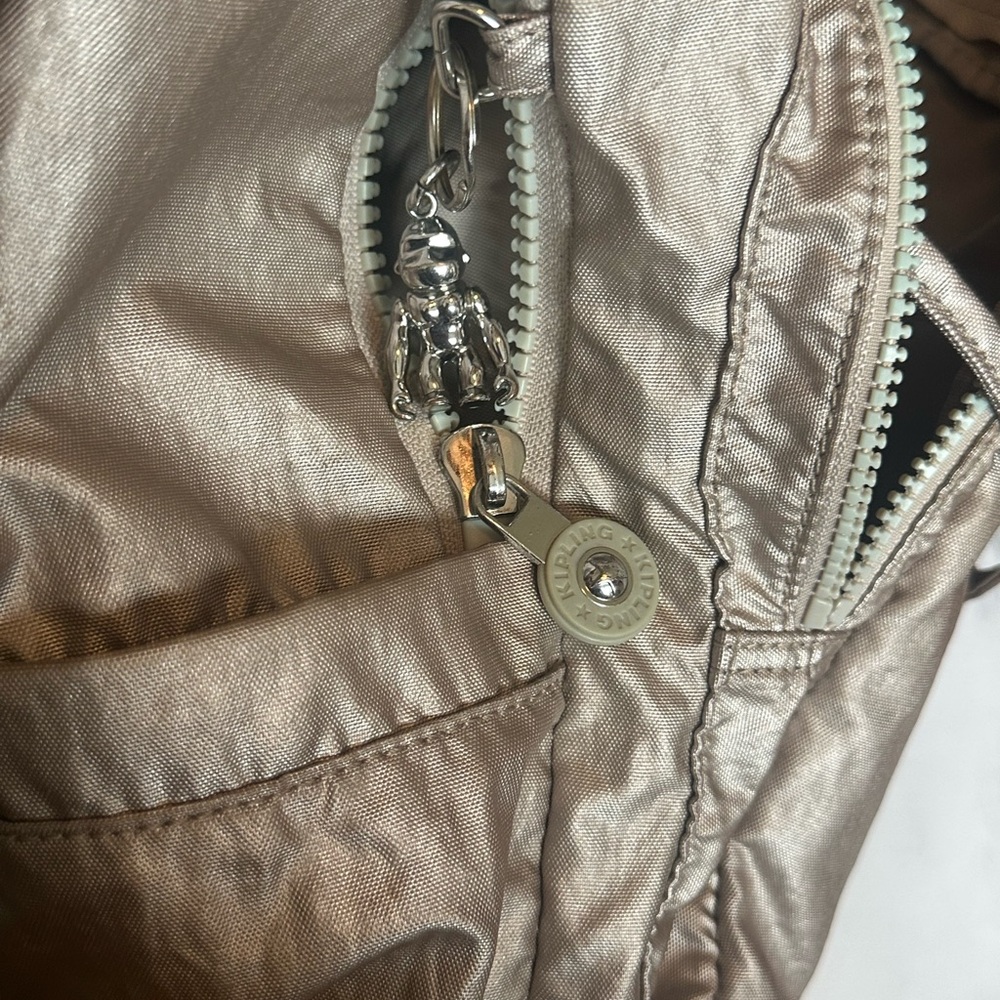 Metallic gold Kipling Bag with Charm Backpack
